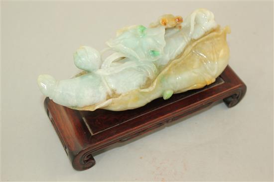 A large Chinese jadeite lotus carving, 20th century, 20.3cm, wood stand